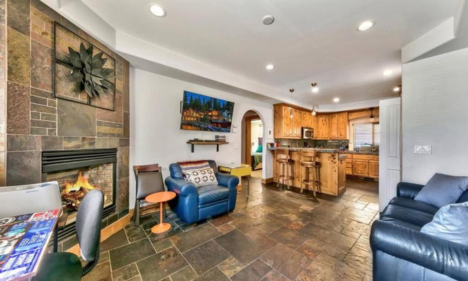 Al Tahoe House | Tahoe Cozy Cabin, 2 Bedroom with a gas fireplace.