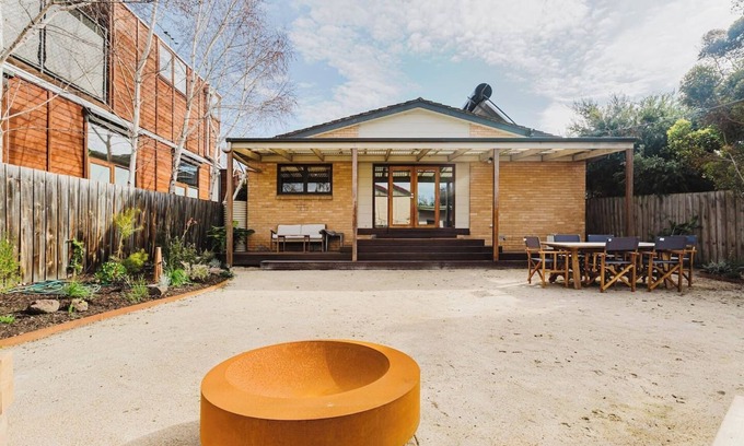 Kensington House | Tangerine Gleam Cheerful Inner City Family Abode