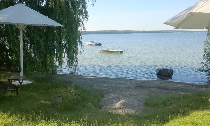 Muritz Apartment | Tern with lake view and terrace, beach, jetty