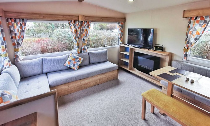 Aberystwyth House | The Gold Plus 2 caravan (pet) is 12ft wide with one double and one twin.