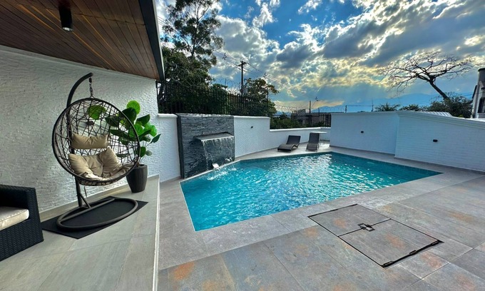 Las Lomas I Villa | The Oasis Eden 4 Bedroom Mansion Exotic Pool 5 min from Provenza,GUEST FRIENDLY.