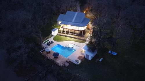 Cedar Lane House | The San Bernard River waterfront provides private access to a spa, boat ramp, and jet skiing