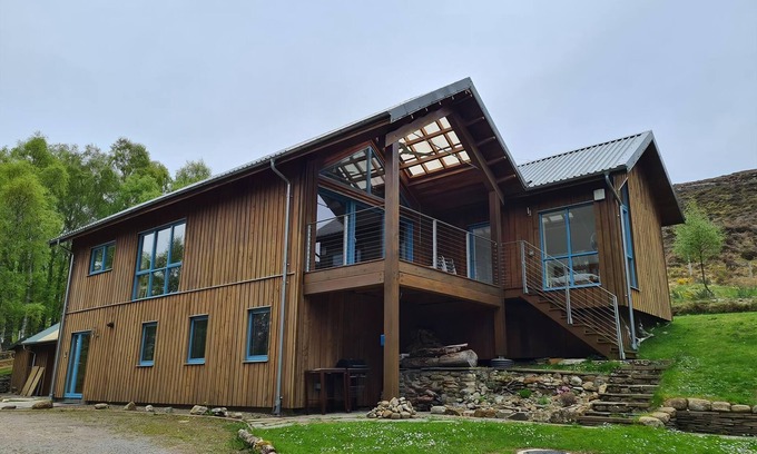 Muir of Ord Cottage | The setting up Strathconon with loch and hill views is truly spectacular.