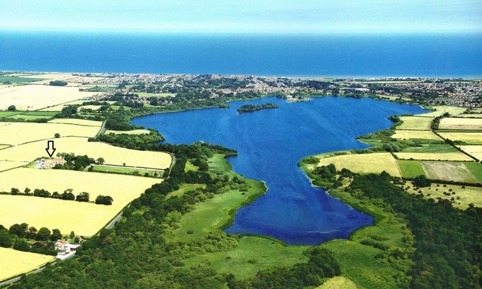 Hornsea House | The Stables, Stunning Barn Conversion, Sleeps 4, Grounds overlook Hornsea Mere