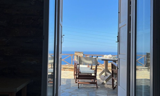 Koundouros House | The Stone Wind Mill. Family friendly .! Owners welcome you.! Live hospitality.!