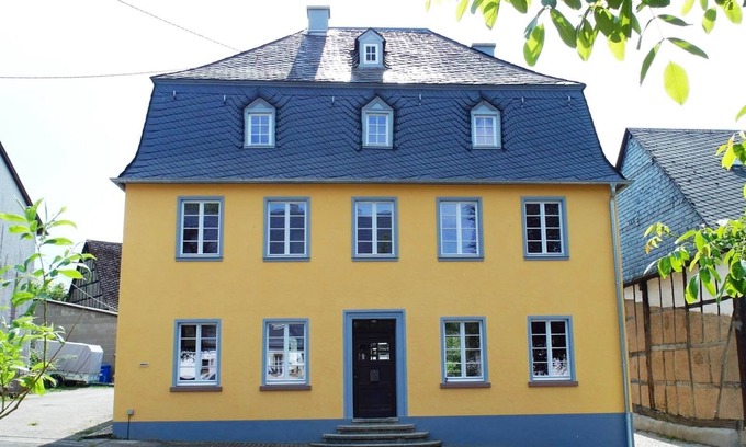 Irmenach House | The yellow vacation home