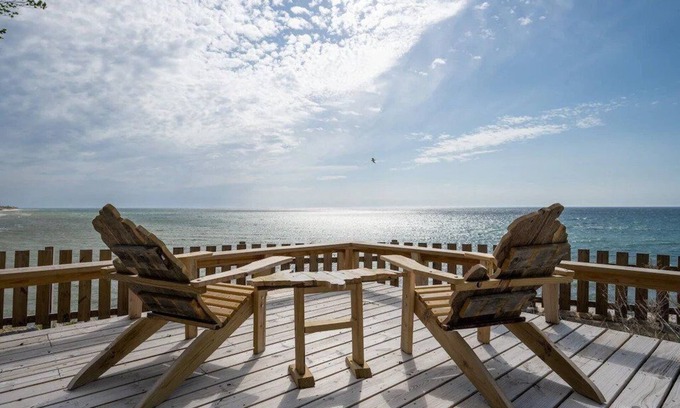 Mears House | This charming vacation home sits directly on Lake Michigan and it delivers!