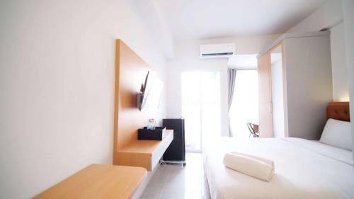 Sidoarjo Apartment | Tidy and Cozy Stay Studio Apartment at Suncity Residence By Travelio