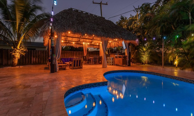 Land of the Presidents House | Tiki Paradise OasisnHome + Pool, Tiki Hut & 10 Min to Beach! New Outdoor Kitchen