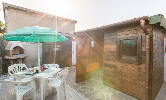 Cascina Apartment | Tiny Green Home with Jacuzzi, Parking and Barbecue