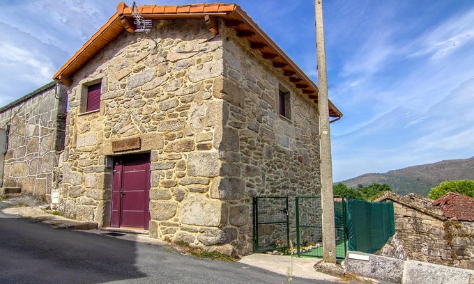 Vilamea House | Traditional stone house with cozy interior.