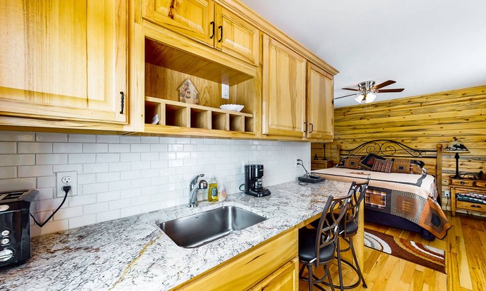 Grand Lake Apartment | Tree-lined studio with lake views, patio, & kitchenette