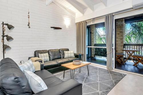 Glenelg North Apartment | 'Treetops at Glenelg' Coastal Stay with Leafy Patio