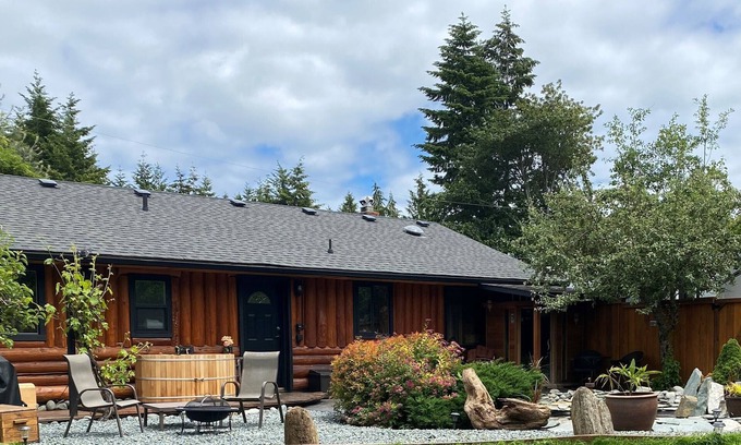 Sooke Cabin | True West Coast experience custom log home with sauna & outside cedar soaker tub