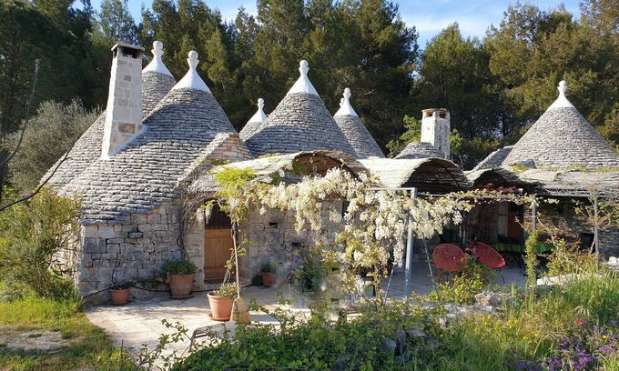 Cisternino Villa | Trullo in the woods, a few steps from a hiking and cycling trail