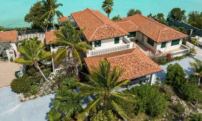 Ocean Point Villa | Turquoise Waterfront 5 Bedroom Rustic Villa