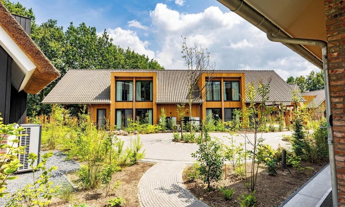 Wekerom House | Two villas, two pools – luxury spa escape for 24 guests, wheelchair accessible.