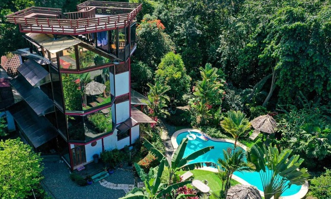Cahuita House | Unique Glass-Fronted Property, Ocean and Mountain Views, Pool.