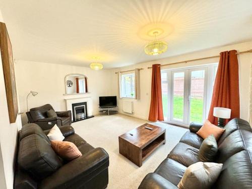 Ashford House | Unique Stays Modern Evergreen House in Ashford!