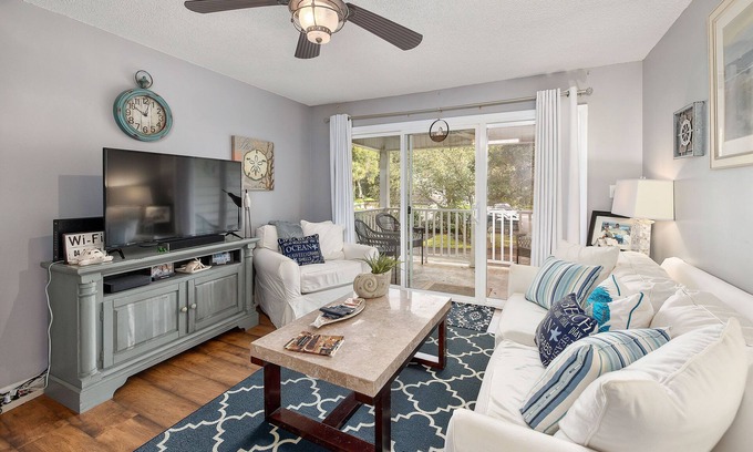 Demere Park Condo | Updated second floor condominium with access to heated pool and tennis courts!
