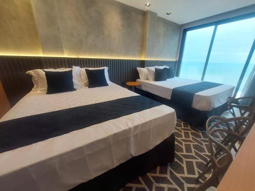 Macae Hotel | V-Home Flat Hotel