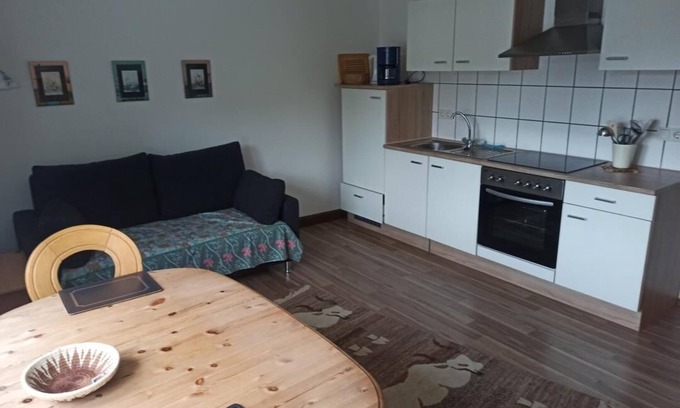 Kuerten Apartment | Vacation apartment Biesfeld-Altes Backhaus