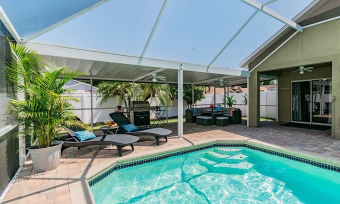 Bearss Plaza House | "Vacation Getaway: Heated private POOL, Outdoor Living, Game Room & Boat Rental"