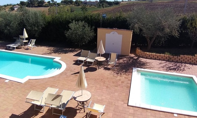 Appignano House | Vacation home of 7 apartments garden, swimming pools common lounge.Suitable for groups