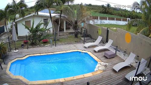 Dubedou Villa | Villa élégante à Saint-François + Piscine privée ouverte toute l’année