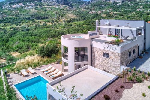 Klis Villa | VILLA CVITA is a modern 5-bedroom villa with a Jacuzzi, a Gym and Finnish Sauna, a heated pool, and amazing views