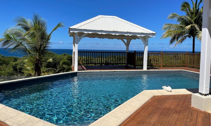 Damencourt Villa | Villa de 4 chambres avec vue sur la mer piscine privee et jardin clos a Le Moule a 1 km de la plage