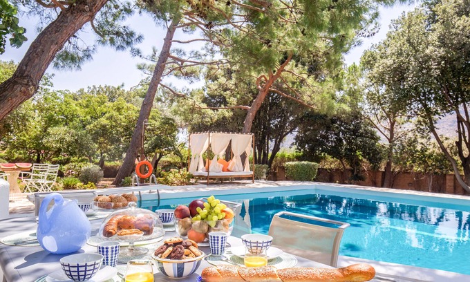 Saronikos Villa | Villa Oasis, coastal villa with private pool and garden by JJ Hospitality-