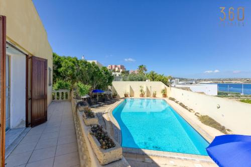 Santa Maria Estate Apartment | Villa with beautiful Views with pool in Mellieha by 360 Estates