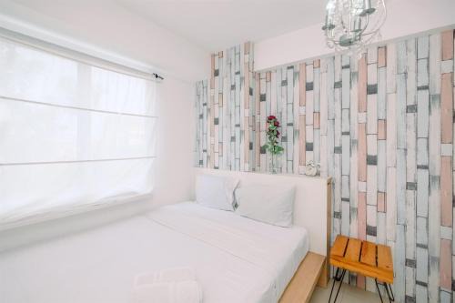 Jatinegara Apartment | Warm and Cozy 2BR at Low Floor Bassura City Apartment By Travelio