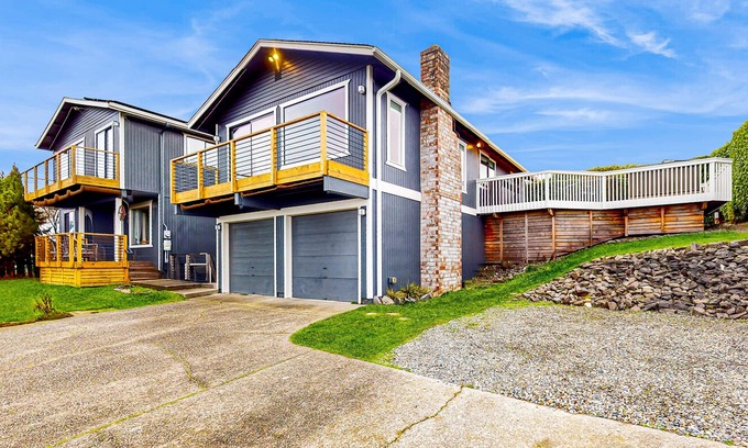 West End House | Water-view home with ADU, gated entry, hot tub, enclosed yard, deck, & 2 W/Ds
