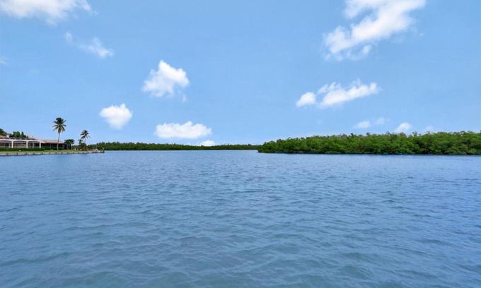 Marco Island House | Waterfront home on key lot with pool/view of river