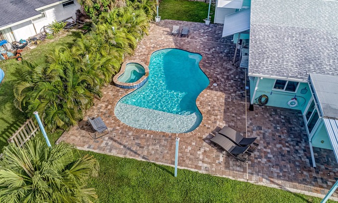 Cocoa Isles House | Waterfront home with saltwater pool, private dock, central AC & washer/dryer