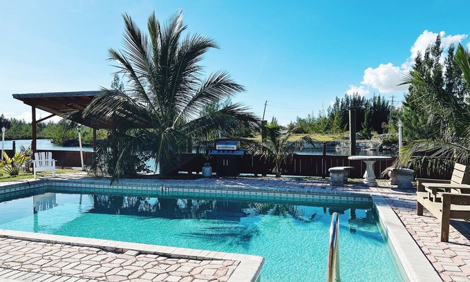 Williams Town House | Waterfront home with private dock near the beach