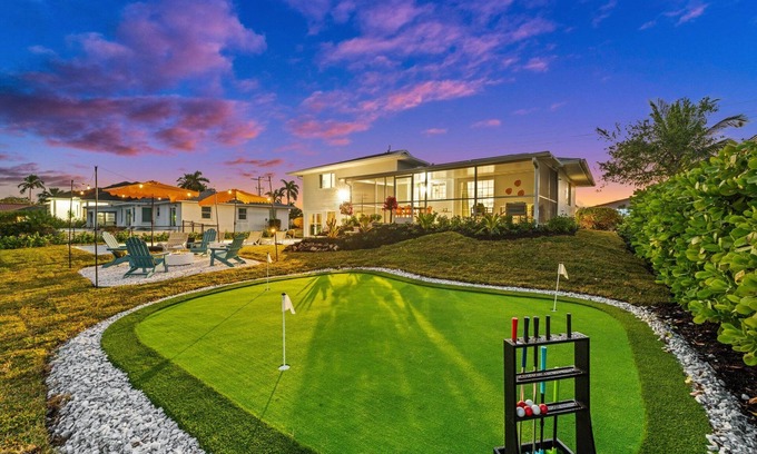 Marco Island Villa | Waterfront, Spa, Kayaks, Sauna, Heated Pool, Arcade, Mini Golf, Fire Pit, Bikes