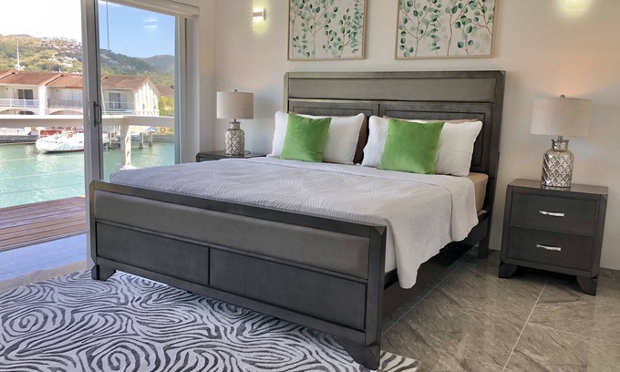 Jolly Harbour Ski Chalet | Waterfront Villa 230A, South Finger