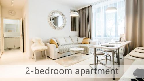 Old Town Apartment | White Apartments with AC by Kovee