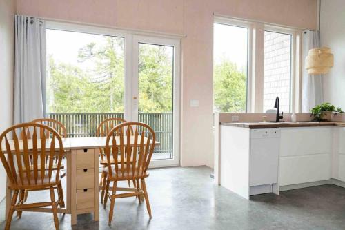 Ucluelet Apartment | WHITE HAUS nested in Rainforest close to beach and trail