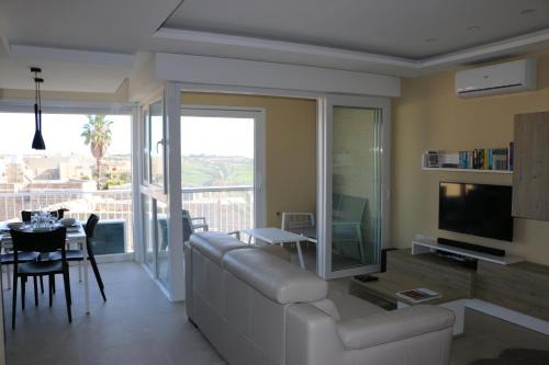 Qala Apartment | Wileg 4A Luxury Studio Apartment with Shared Swimming Pool.