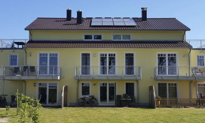 Borgerende Apartment | Wunderschöne Ferienwohnung mit Kamin, Fußbodenheizung und Blick in die Natur und nur 200 m bis zur Ostsee