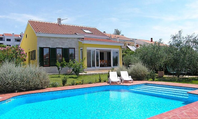 Diklo House | Yellow House by Interhome