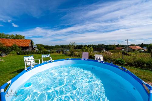 Orzysz House | Zacisze Rostken, Wypoczynek na Mazurach, Dom Całoroczny z Prywatną Plażą