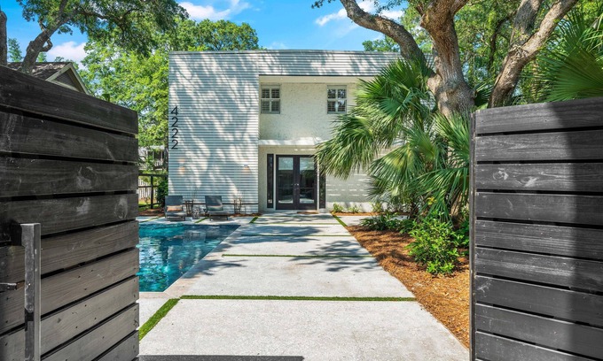 East Beach House | Zen-N-Sea offers poolside relaxation and near the beach entrance, sleeps 8