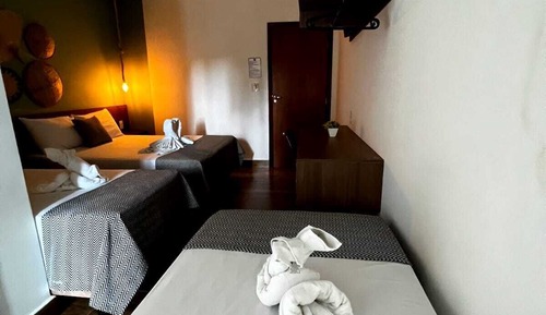 Quarto Quadruplo com Varanda