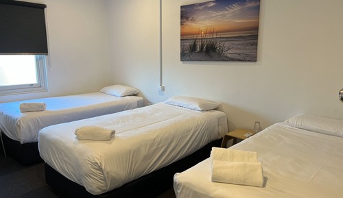 Triple Single Room (Shared Bathroom)