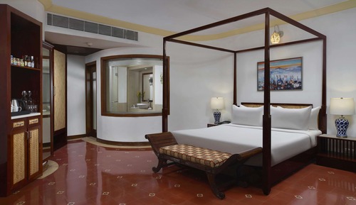 Executive Suite with Balcony and Partial Garden View